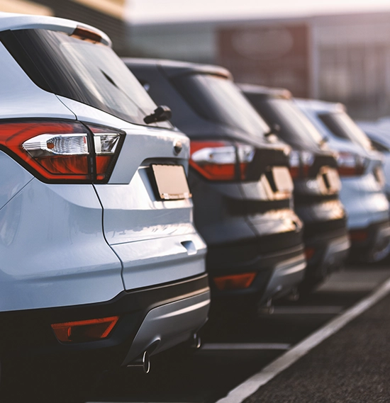 cars parked in row on outdoor parking
